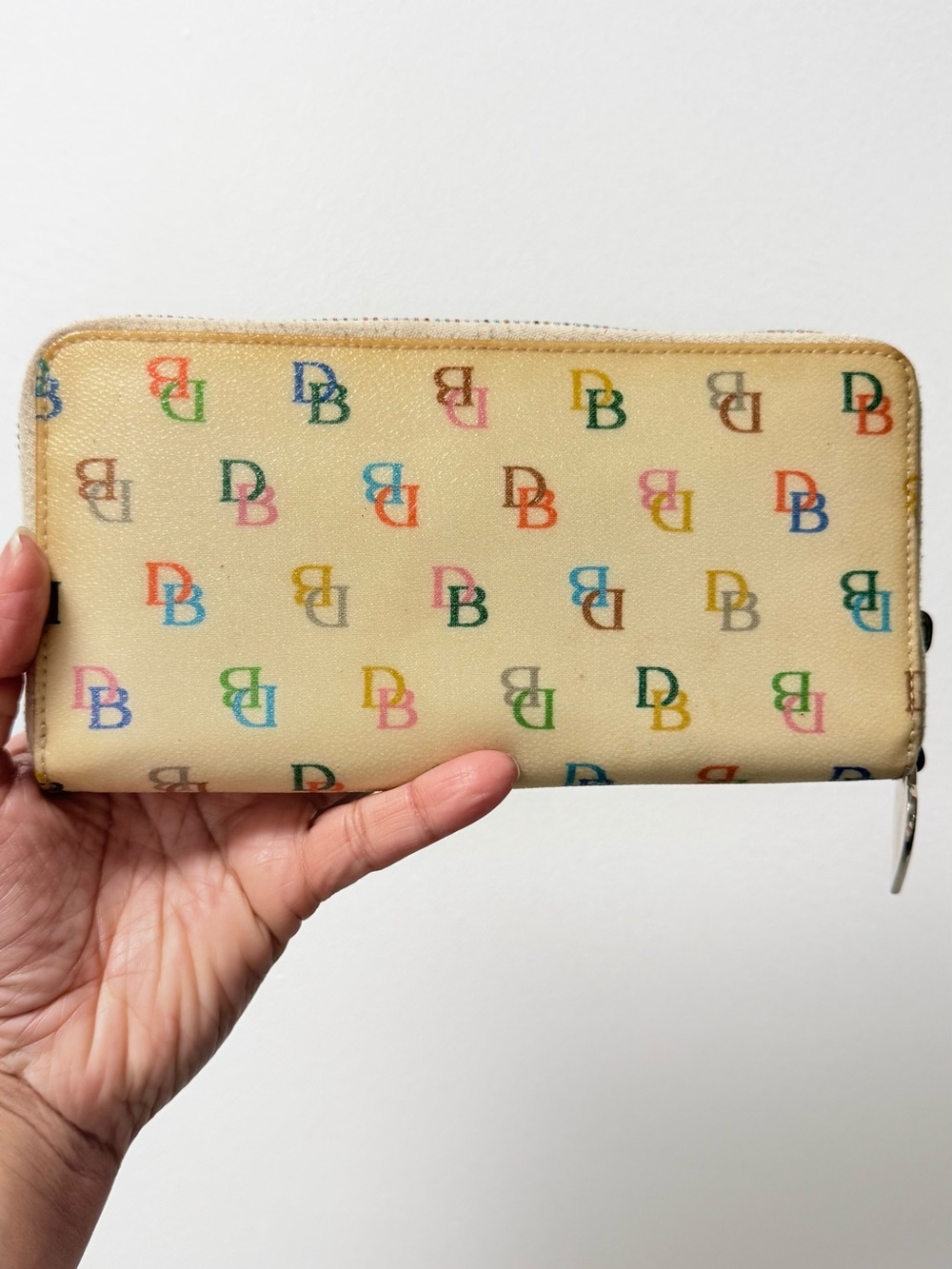 Dooney & Bourke Beige Zip-Around Wallet with Multicolor DB Print